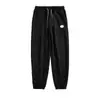 Pantalones de hombre al por mayor, modernos y versátiles, pantalones deportivos tipo jogger para primavera y verano, pantalones largos casuales de gofre holgados para hombre