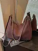 Bolsa de grande capacidade transfronteiriça, bolsa tote com corrente da moda, nova coleção outono 2026, bolsa de ombro/transversal casual retrô para o dia a dia