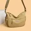 Tendencia transfronteriza bolsa ligera de nailon 2026 primavera bolso casual para mujer bolso de hombro de color liso bolso cruzado de compras para mujer