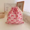 Bolsa de tela de algodón con cordón y estampado de lazo bolsa de almacenamiento para viajes clasificación en casa bolsa de algodón al por mayor