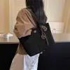 Bolsa de mano minimalista transfronteriza, nuevo estilo 2026, gran capacidad, bolso de hombro moderno, texturizado, casual y adecuado para el trabajo, se puede llevar debajo del brazo