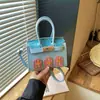 Nuevo Bolso Platinum para Niñas Otoño 2026 PU Estilo Coreano Bloque de Color Lindo Mini Bolso Infantil con Colgante, Portaudífonos y Portamaquillaje