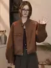 Chaqueta corta de cuero flocado retro para mujer, nuevo estilo otoño 2026, versátil, adelgazante, cuello alto, top chaqueta elegante