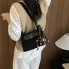 Bolso de viajero transfronterizo moderno y elegante para el otoño de 2026: Estilo coreano, diseño de nicho, retro y único, adecuado para uso casual y como bolso de hombro o cruzado