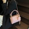 Bolsa de mão tipo balde com sensação de luxo, nova moda primavera 2025, bolsa de ombro simples e versátil, tendência, bolsa carteiro casual