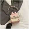 Bolso Pequeño Lindo Mini Lápiz Labial Transfronterizo Bolso de Mujer 2025 Nuevo Lazo Versátil Bandolera Bolso de Hombro de Cadena
