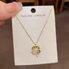 Moda de Nicho Simple Chapado en Diamante Cuadros Flor de Cuatro Hojas Collar Personalidad Femenina Lujo Ligero Versátil Cadena de Clavícula de Gama Alta Venta al por Mayor