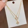 Pulsera de Hilo con Borla de Hierba de la Suerte de Zirconia Lujo Ligero Moda de Gama Alta Pulsera Versátil Nuevo Estilo Chino Retro Elegante para Mujer