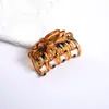 Pinza para el pelo de leopardo transparente colorida personalizada de 4,5 cm, garra de pelo de ojo de gato con doble fila de dientes, punta media, accesorios para el pelo de venta caliente transfronteriza