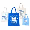 Bolsas de lona personalizadas con logo para clínicas dentales, bolsos de lona promocionales para hospitales dentales y bolsas de regalo educativas para la salud bucal