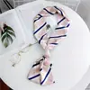 Bufanda larga nueva bufanda pequeña para mujer de Corea del Sur primavera y otoño bufanda fina estrecha de doble cara corbata de moda decorativa