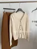 Cardigan de Punto de Lana de Oveja al 5.5% Color Puro Suave Cuello en V para Mujer Estilo Coreano Holgado Ajustado Chaqueta Suéter Otoño e Invierno 2025