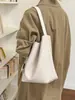 Bolso de mano tejido con patrón transfronterizo para mujer, nuevo bolso de hombro único de nicho 2026 para mujer, bolsa de mano tote vintage versátil de gran capacidad