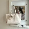Bolso de mano retro para mujer 2026 verano nuevo de moda elegante versión coreana de alto valor gran capacidad bolso de hombro para el trabajo