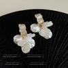 Brincos de Borla Pétala de Concha de Luxo Leve Estilo Francês Brincos de Zircônia Personalizados Nicho High-End Brincos Super Fada para Mulheres
