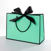Bolsa de Mano Lazo Bolsa de Papel Impresión Bolsa para Prenda Bolsa de Regalo Bolsa de Compras Bolsa de Embalaje Bolsa Cosmética Color Comercio Exterior