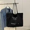 2025 Nova Bolsa de Lona Estilo Coreano Grande Capacidade Casual Ombro Estudante para Ir ao Trabalho Bolsa de Mão Grande Capacidade para Mulheres