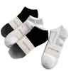 Calcetines de color liso para mujer, calcetines cortos para hombre, calcetines deportivos, calcetines negros y blancos, calcetines para estudiantes, calcetines de pareja, calcetines versátiles para viajar, calcetines tobilleros, industria del calcetín de Zhuji