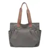 Bolso Tote de Lona Nuevo de Moda 2026, Bolso de Hombro de Gran Capacidad para Mujeres, Simple y Versátil para Estudiantes y el Viaje Diario