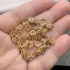 Chapado en Cobre Oro de 18 Quilates Electrochapado Micro-Pavimentado Corte de Diamante Florero Espaciador Pulsera Collar Joyería de Cuentas DIY Accesorios para Ropa