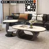 Mesa de centro de pizarra italiana minimalista de alta gama para uso doméstico, sala de estar simple moderna ovalada nuevo modelo con un sentido de combinación de lujo ligero