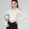 Top de Yoga Europeo y Americano lulu Traje de Yoga Desnudo Nuevo Espalda Descubierta Nylon Sexy Deportivo Manga Larga Ajustado Camiseta Inclinada