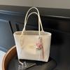 Bolsa Tote Retro de Grande Capacidade com Contraste de Cores Feminina 2025 Novos Têxteis Simples Casual para o Dia a Dia Bolsa de Ombro