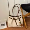 Moda retro transfronteriza, bolso tote minimalista para el día a día, diseño de nicho, alta calidad, casual, elegante y ligero, bolso de hombro/bolso de axila