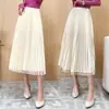 Falda de malla femenina superfada cintura alta primavera y verano falda de gasa una generación de pelo falda larga de tres capas