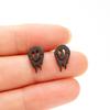 Nuevos pendientes de fantasma de Halloween de acero inoxidable de moda transfronteriza europea y americana con divertidos pendientes sonrientes en stock al por mayor