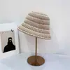 Al por mayor 25 Años Principios de Otoño Nuevo Estilo Coreano Calado Simple Tejido Sombrero de Pescador para Mujeres Casual Versátil Adelgazante Sombrero de Cubo Moderno