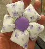 Accesorios para joyería floral pequeños DIY al por mayor broche de lazo lindo tocado de flor de tulipán accesorios para bolso mujer