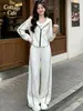 Conjunto deportivo casual blanco para mujer, moda otoño 2026 nuevo elegante de alta gama, sudadera con capucha y pantalones largos conjunto de tres piezas