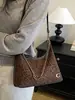 Bolso de axila de gamuza mate vintage para mujer, Nuevo bolso de hombro cruzado texturizado de nicho de alta gama Otoño/Invierno 2026