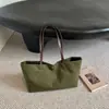 Bolso de mano exquisito de nicho estilo coreano, bolso de hombro, bolso para el antebrazo de uso diario, bolso de mujer, bolso tote de lunares, nuevo modelo para mujer
