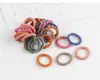 Nuevo anillo de alambre de teléfono de tamaño pequeño japonés y coreano para niños, plástico ambiental, pelo de niña, oruga, anillo de pelo negro pequeño