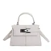 Bolsa Kelly Simples e Estilosa com Padrão Trançado para Mulheres Moda Versátil Bolsa de Ombro Único Transversal 2026 Nova Bolsa Estilosa Bolsa de Mão