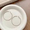 Pendientes de aro con textura de espiral, moda europea y americana, aguja de plata S925, lujo ligero de alta gama, diseño exagerado y único, pendientes elegantes