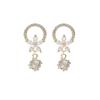 Pendientes de circonita de lujo ligeros para mujer, elegantes, de estilo europeo y americano, con hebilla de metal distintiva, joyería de moda transfronteriza.