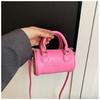 Bolso de mujer nuevo de moda de PU de color sólido, informal, con letras, cilíndrico, estilo retro, popular, para hombro, bandolera