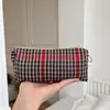 Elegante bolsa de cosméticos estilo británico, perfecta para estudiantes de secundaria, un estuche portátil y una pequeña bolsa de almacenamiento para cosméticos - disponible para venta al por mayor