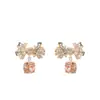 Pendientes de Tachuela de Circonita con Lazo Multicolor Temperamento Elegante de Gama Alta Azúcar Cubo Circonita Pendientes Coloridos de Comercio Exterior