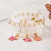 Venda Quente Transfronteiriça Estilo Boêmio Flor Olho Borboleta Pingente Pulseira Multicamada Corda Elástica Pulseira de Contas