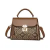 Bolsa de Mão Feminina Texturizada Retro de Luxo 2026 Novo Estilo Elegante Pequena Quadrada Feminina Design de Nicho Bolsa Transversal