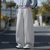 Novas calças casuais de malha grossa estilo americano para outono e inverno para homens, calças de moletom de design high-street largas e soltas, calças de perna reta