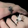 Anel Aberto Asas de Anjo Novo Europeu e Americano Liga de Metal Asas Quebradas Preto e Branco "Redenção" Anel de Casal