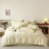 Nuevo Juego de Cuatro Piezas de Algodón Puro de Color Sólido Estilo Sencillo, Sábana y Funda de Edredón de Algodón Lavado Teñido en Hilo, Adecuado para Todas las Estaciones, Ropa de Cama al por Mayor