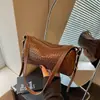 Bolso cruzado pequeño de alta gama para mujer, estilo commuter transfronterizo, nuevo modelo de verano 2026, bolso cilíndrico de un solo hombro estilo Maillard