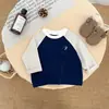 Camiseta de Manga Longa Infantil Primavera 2025 Nova Primavera e Outono Combinação de Cores Infantil Camiseta Básica Top Casual para Bebê Roupas Infantis Tendência t