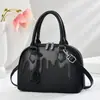 2025 Bolso Elegante de Marca Versátil para Mujeres de Mediana Edad Bolso Cruzado Nuevo Tejido Gran Capacidad Sentido de Alta Gama